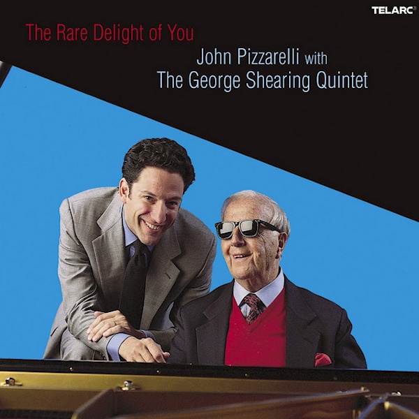 John Pizzarelli with The George Shearing Quintet - The Rare Delight Of YouJohn-Pizzarelli-with-The-George-Shearing-Quintet-The-Rare-Delight-Of-You.jpg
